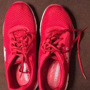 Red Skecher sneakers